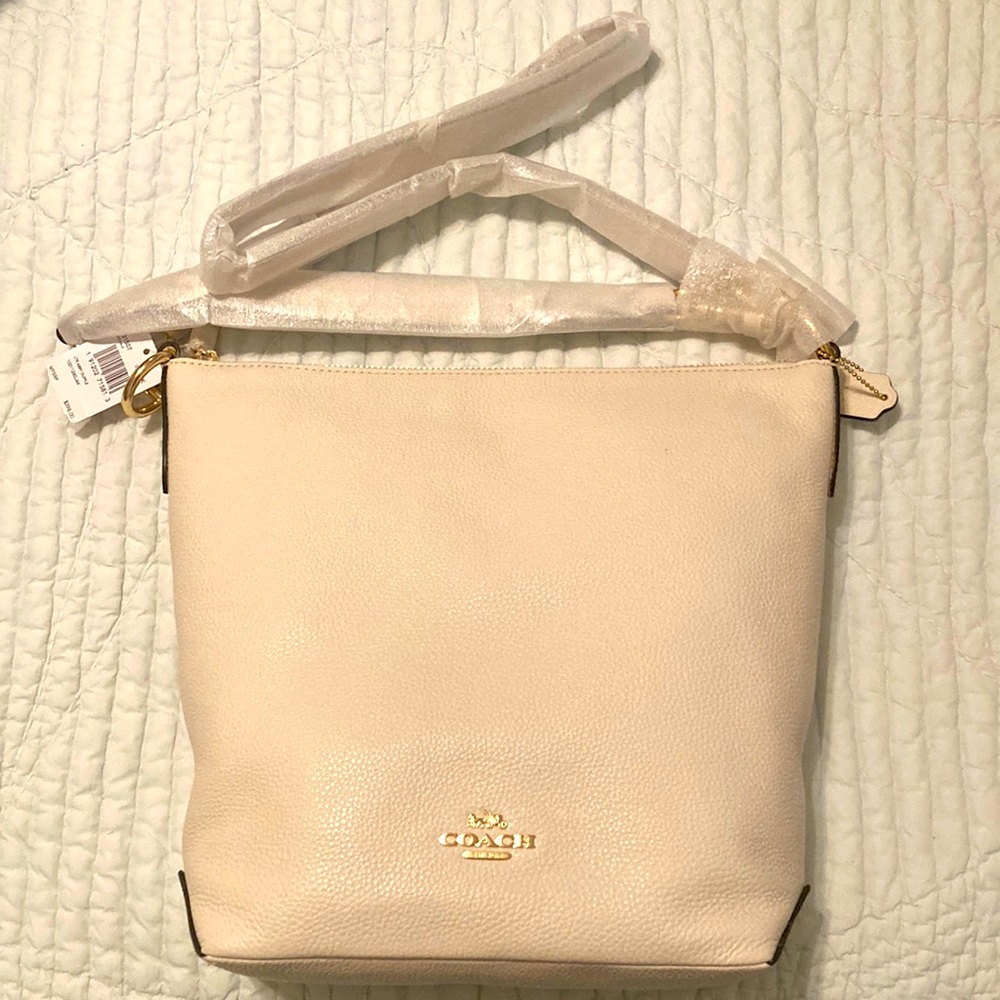 Abbey Duffel Coach leather handbag.